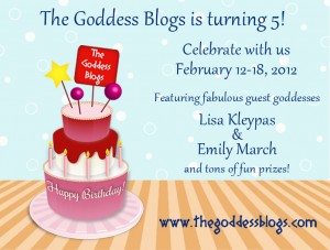 A birthday cake on a table with information on The Goddess Blogs' birthday celebration event